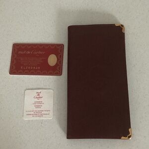 Cartier Deep Red Wallet with Gold Details
